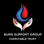 Burn Support Group Charitable Trust logo featuring a red-and-blue flame held by two hands, with white lettering on a black background.