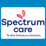 Spectrum Care logo with an orange and pink stylised leaf above blue lettering reading “Spectrum care” and smaller text underneath reading “Te Wāi Kahukura Atawhai” on a white background.