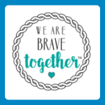 We Are Brave Together logo, featuring the words “We Are Brave” in black and “together” in teal script, with a small teal heart underneath, enclosed by a grey braided circular border on a white background.