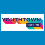Youthtown logo with blue and pink text reading “YOUTHTOWN” and a small dark blue box saying “SINCE 1932” on a white background.