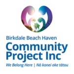 Birkdale Beach Haven Community Project Inc logo, featuring a multicoloured abstract heart-shaped community emblem above the organisation’s name in blue, with the tagline “We Belong Here | Nō konei ake tātou” underneath, on a white background.