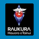 Raukura Hauora o Tainui logo, featuring a stylised red face with white and grey feather-like forms inside a faceted blue and purple diamond, above the organisation’s name in white on a black background.