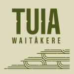 Tuia Waitākere logo with bold olive-green text reading “TUIA WAITĀKERE” above stylised horizontal linework on a light beige background.