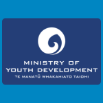 Ministry of Youth Development logo with a white koru-like spiral emblem above white text reading “MINISTRY OF YOUTH DEVELOPMENT” and smaller te reo Māori text on a blue background.