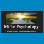 Mi’Te Psychology logo, featuring a landscape photograph of sunlight over water and green hills above the name “Mi’Te Psychology” in white, with the tagline “Human Beings Aiding Human Beings” underneath, on a dark background.