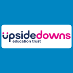 Upside Downs Education Trust logo with blue and pink text reading “upsidedowns” and smaller dark blue text reading “education trust” on a white background.