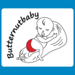 Butternutbaby logo with a line drawing of a baby sitting on a butternut, wearing a red nappy, and black script text reading “Butternutbaby".
