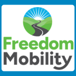 Freedom Mobility logo with a stylised road leading toward a sunrise over green hills, above green and grey text reading “Freedom Mobility.”