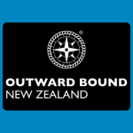 Outward Bound New Zealand logo, featuring a white compass rose surrounded by a circular rope design above the organisation’s name in white capital letters, on a black background.