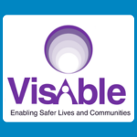VisAble logo with a layered purple circular symbol above bold purple lettering and the tagline “Enabling Safer Lives and Communities” on a white background.